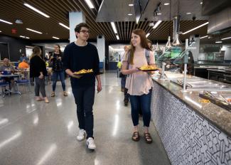 Students getting lunch in dining hall