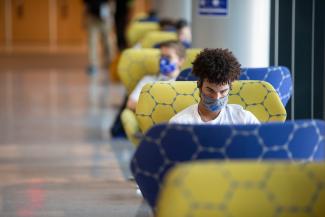 Student sitting in student center