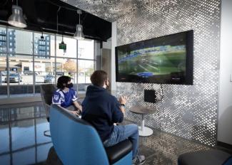 Students gaming in Esports lounge