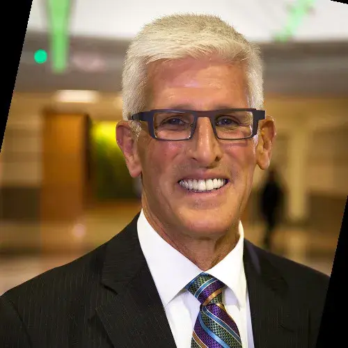 Headshot of Craig Collins indoors